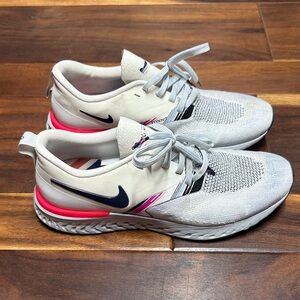 Nike Women's Light Gray Flyknit Running Shoes with Pink and Navy Accents